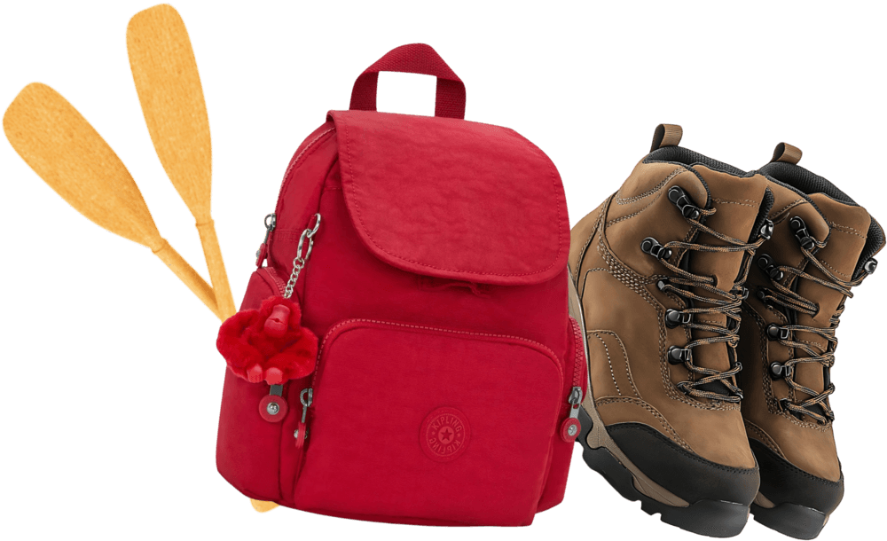 Canoe paddles, a red backpack, and hiking boots